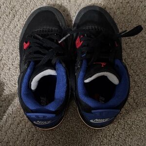 Jordan Nike Kids Black and Red Sneakers with Blue Accents